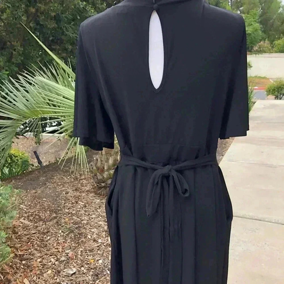 Torrid Surplice Flutter Sleeve Black Romper Size 12 - Picture 7 of 11